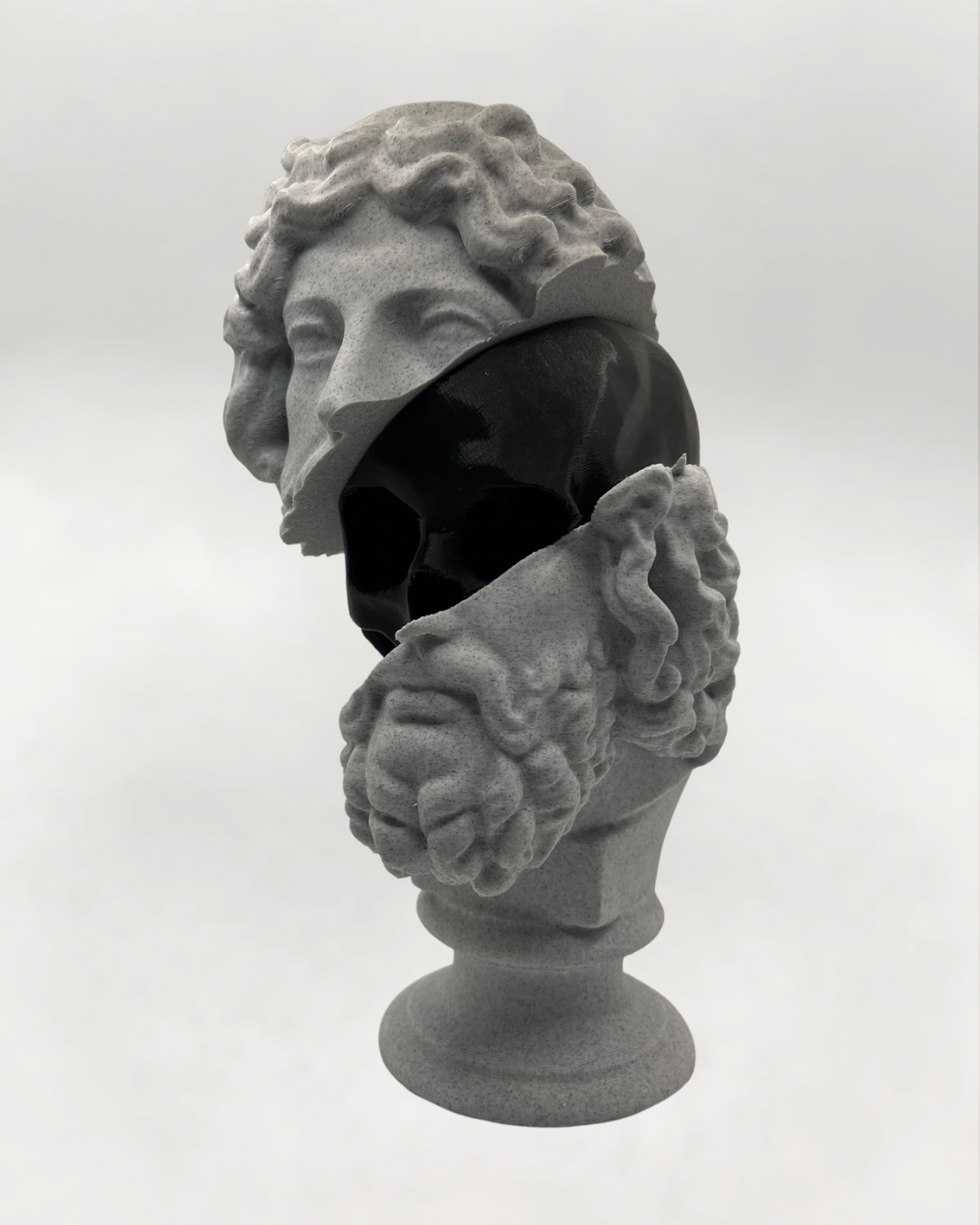 Split statue with skull